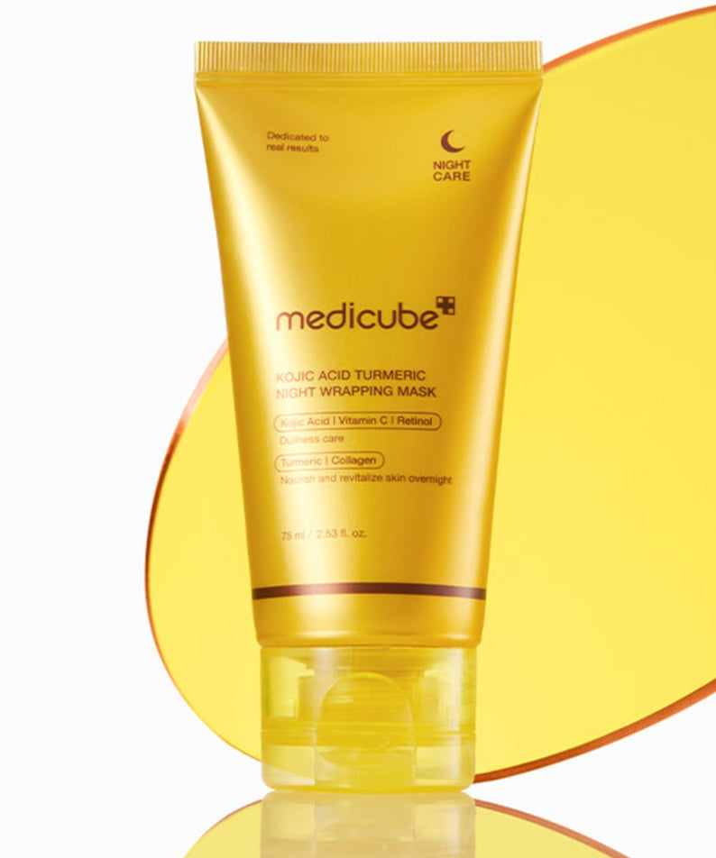 MEDICUBE Kojic Acid Turmeric Vita Wrapping Mask 75ml de medicube, tube jaune sur fond lumineux, contexte skincare