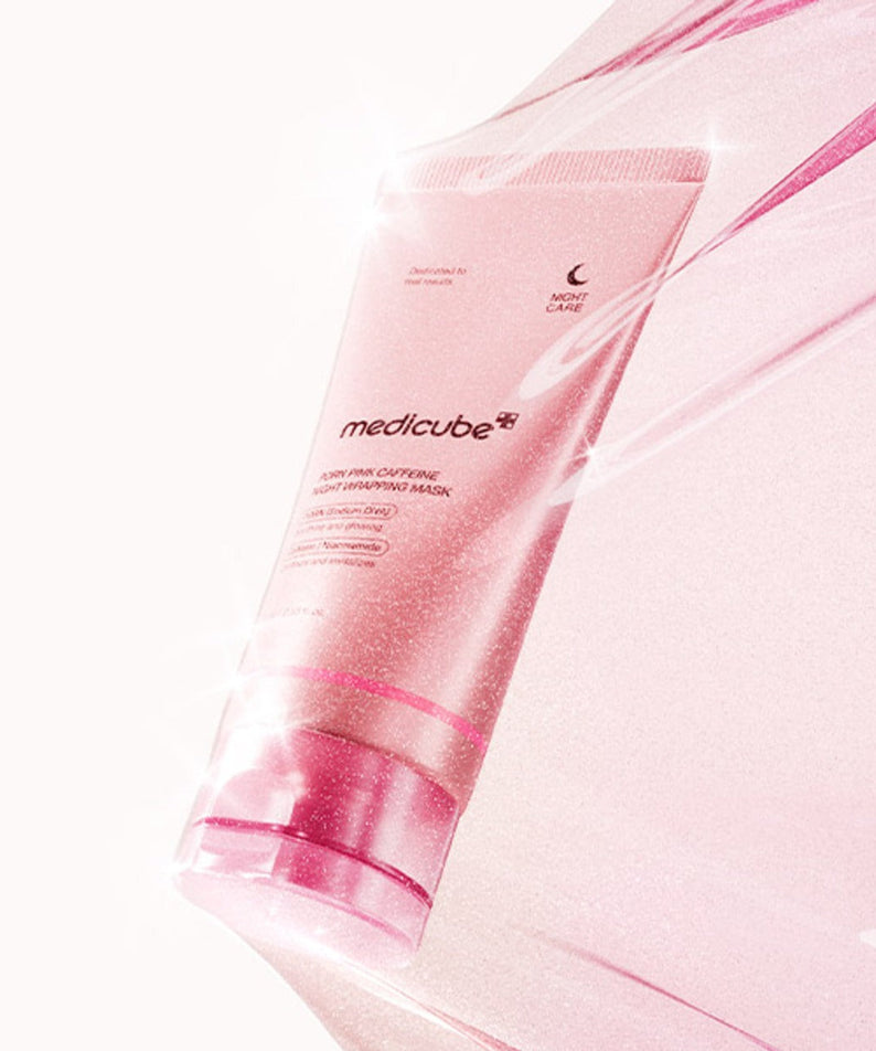 Image du produit MEDICUBE PDRN Pink Caffeine Night Wrapping Mask 75ml en tube rose brillant, soin de nuit pour la peau.
