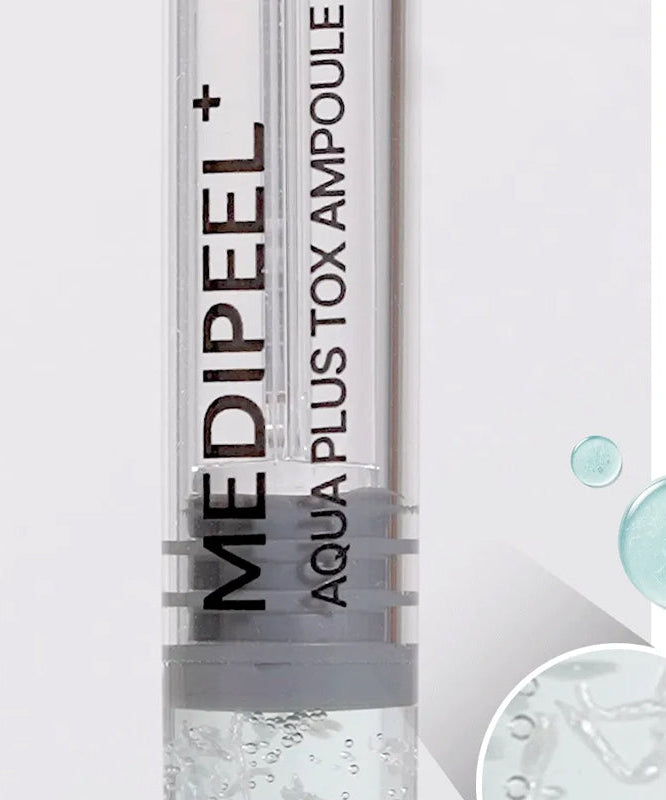 MEDIPEEL Aqua Plus Tox Ampoule 35ml en gros plan, flacon et gouttes d’eau, contexte cosmétique, soin hydratant français