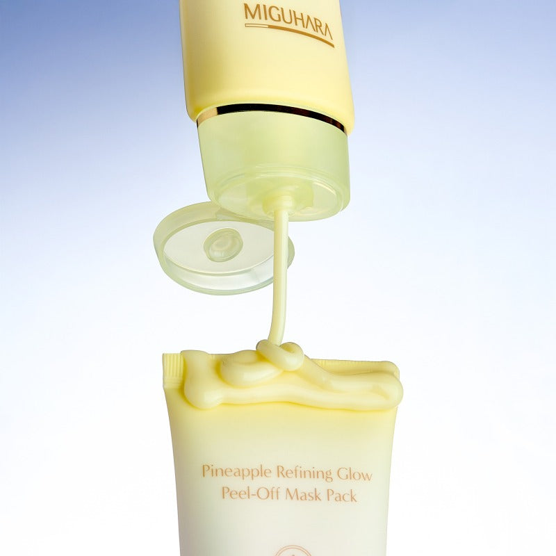 MIGUHARA Pineapple Refining Glow Peel Off Mask Pack 60ml, masque peel-off à l’ananas, tube jaune sur fond clair.