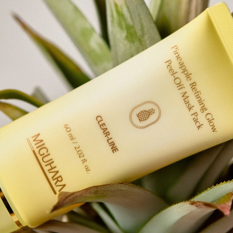 MIGUHARA Pineapple Refining Glow Peel Off Mask Pack 60ml de la marque, sur fond d’ananas et aloé en gros plan