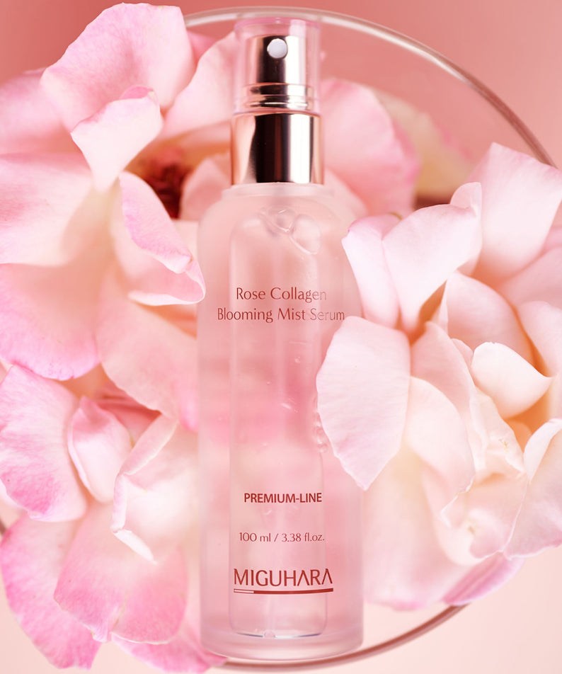 MIGUHARA  Rose Collagen Blooming Mist Serum 100ml, brume visage rose collagène sur pétales, flacon lumineux sur fond rose.