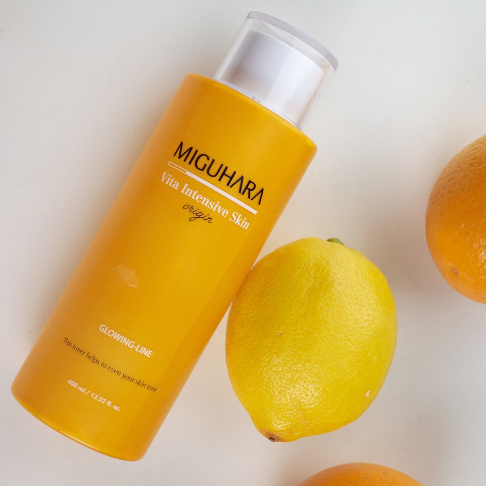 MIGUHARA Vita Intensive Skin Origin 400ml, flacon jaune sur fond clair avec agrumes, marque MIGUHARA en visuel produit.