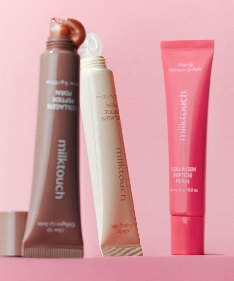 MILK TOUCH Glow Up Collagen Lip Balm 15g de la marque MILK TOUCH, tube rose sur fond rose, photo produit