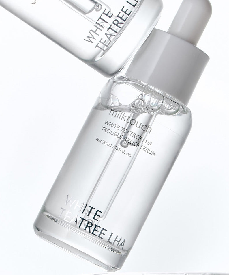 MILK TOUCH White Tea Tree Laha Trouble Relief Serum 30ml, flacons blancs sur fond clair, marque MILK TOUCH en gros.