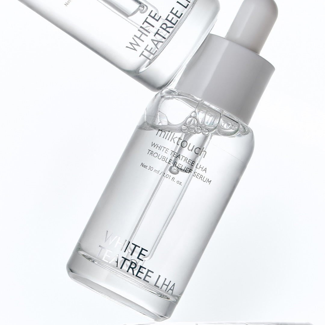 MILK TOUCH White Tea Tree Laha Trouble Relief Serum 30ml, flacons blancs sur fond clair, marque MILK TOUCH en gros.