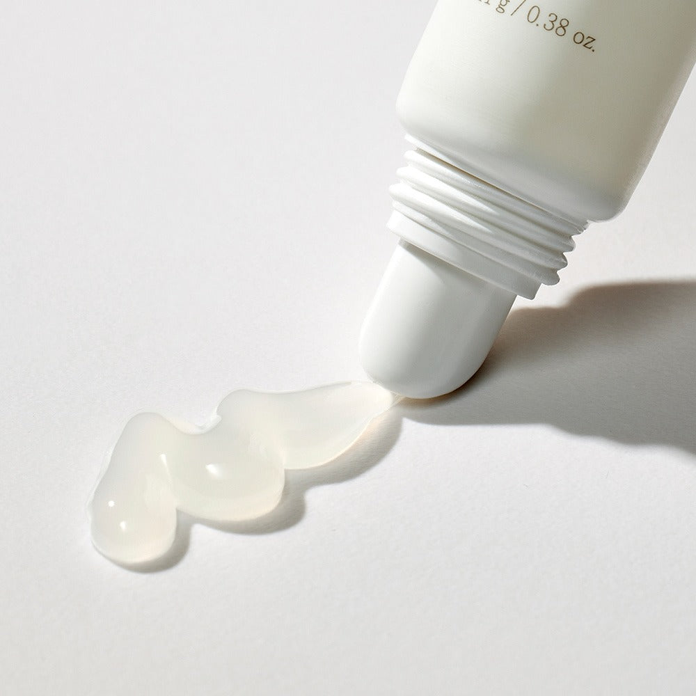 MIXSOON Natural Bean Lip Mask Bean 11g : masque lèvres à la texture blanche, tube de la marque en gros plan sur fond clair.
