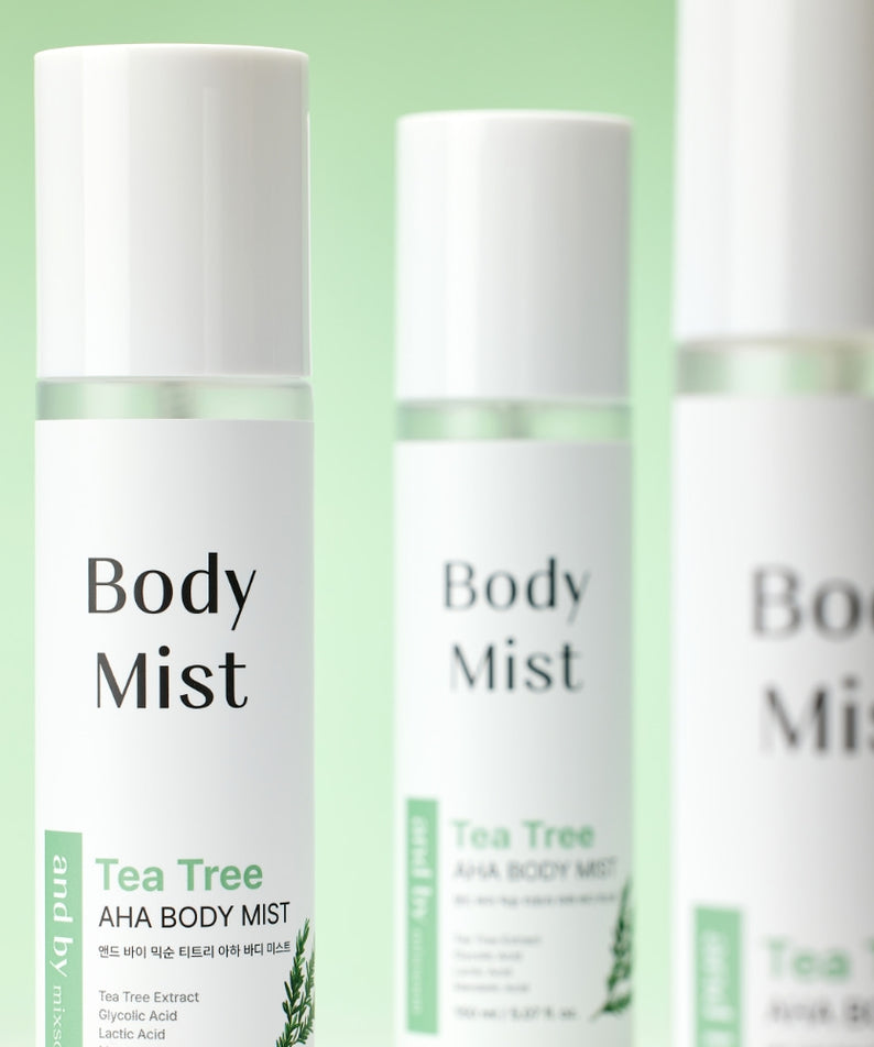 MIXSOON Tea Tree AHA Body Mist 150ml de marque MIXSOON, flacons Body Mist sur fond vert clair (contexte visuel).