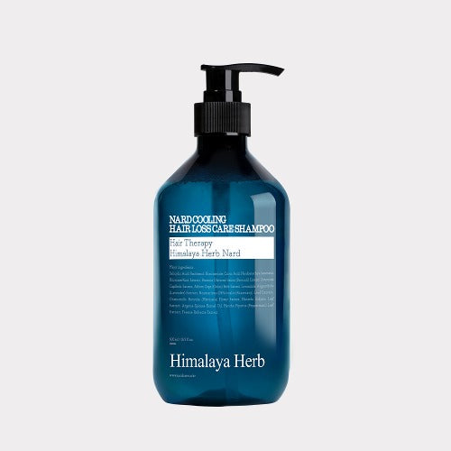NARD Cooling Anti-Hair Loss Shampoo 500ml de NARD sur fond blanc, flacon bleu avec pompe, contexte visuel produit.
