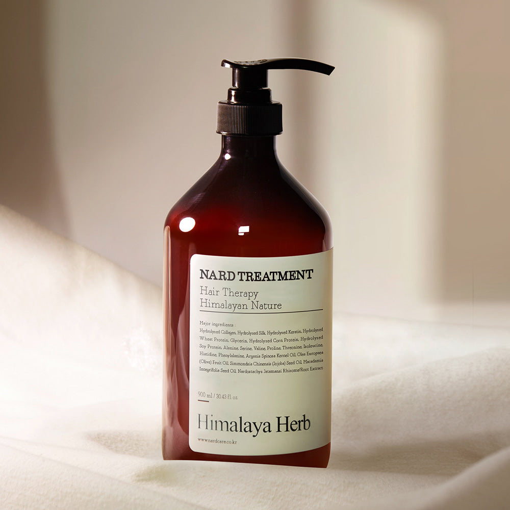 Photo du NARD Treatment 1000ml de marque NARD, flacon rouge à pompe, sur fond clair, contexte spa beauté.