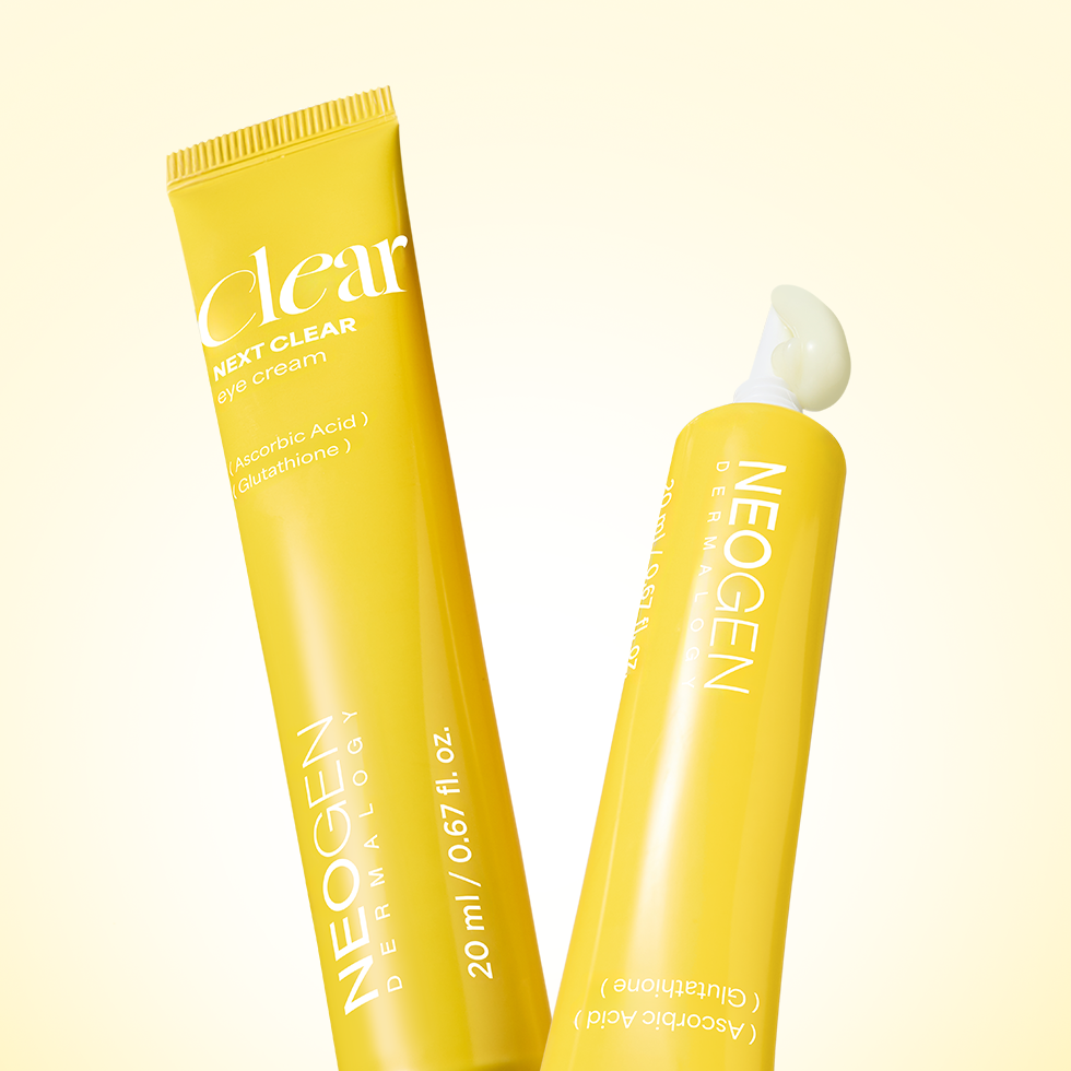 NEOGEN  Next Clear Eye Cream 20ml de la marque NEOGEN, tube jaune et applicateur, sur fond clair