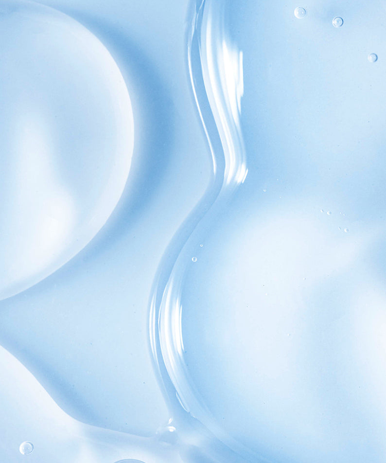 Texture du sérum NEOGEN Real Hya Panthenol Serum 30ml sur fond bleu