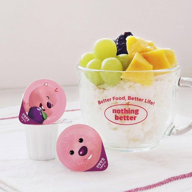 Décris l'image en français: NOTHING BETTER Zanmang Loopy Cup Purun & Lactobacillus 14p, tasse avec fruits, marque Nothing Better.