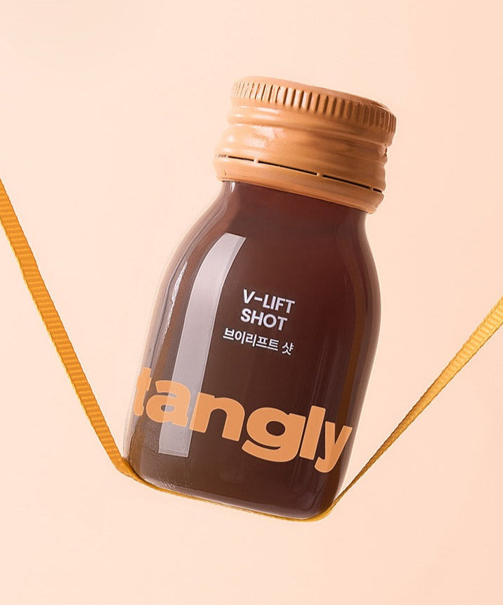 Rafraîchissez-vous avec NOTHING BETTER Tangly V-Life Shot 7 Bottles, capturé en suspension pour un effet énergisant et vivifiant.