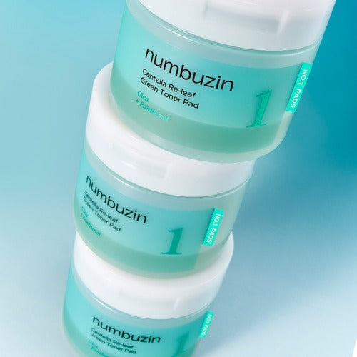 NUMBUZIN No.1 Centella Re-leaf Green Toner Pad 70 Sheets, packs verts numérotés 1 sur fond bleu (marque num buz in).