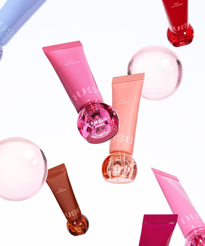 Collection de gloss labial NUSE Nuzzle Reju Lip Gloss avec différentes teintes vibrantes.