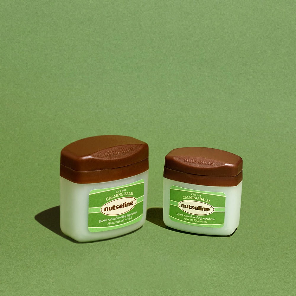 NUTSELINE Cica Nut Calming Balm Season 2 50ml, pots de baume apaisant NUTSELINE sur fond vert, vue produit.