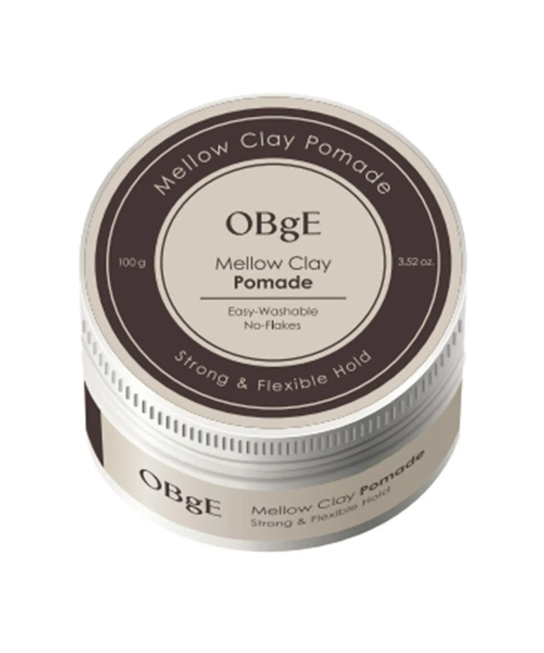 OBGE Mellow Clay Pomade 100g de la marque OBGE, pot de cire coiffante sur fond clair, vue produit.