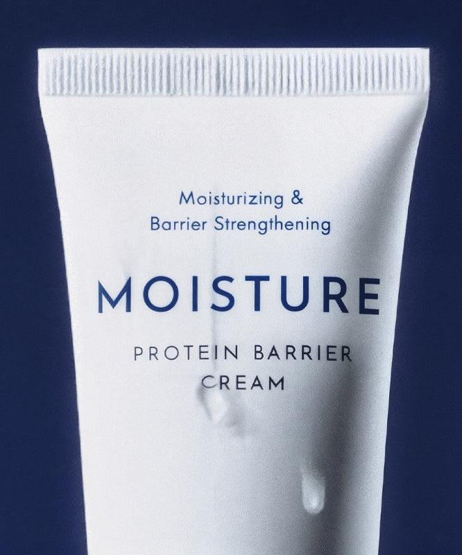 OBGE Moisture Protein Barrier Cream 150ml, tube blanc sur fond bleu, visuel produit cosmétique en gros plan.