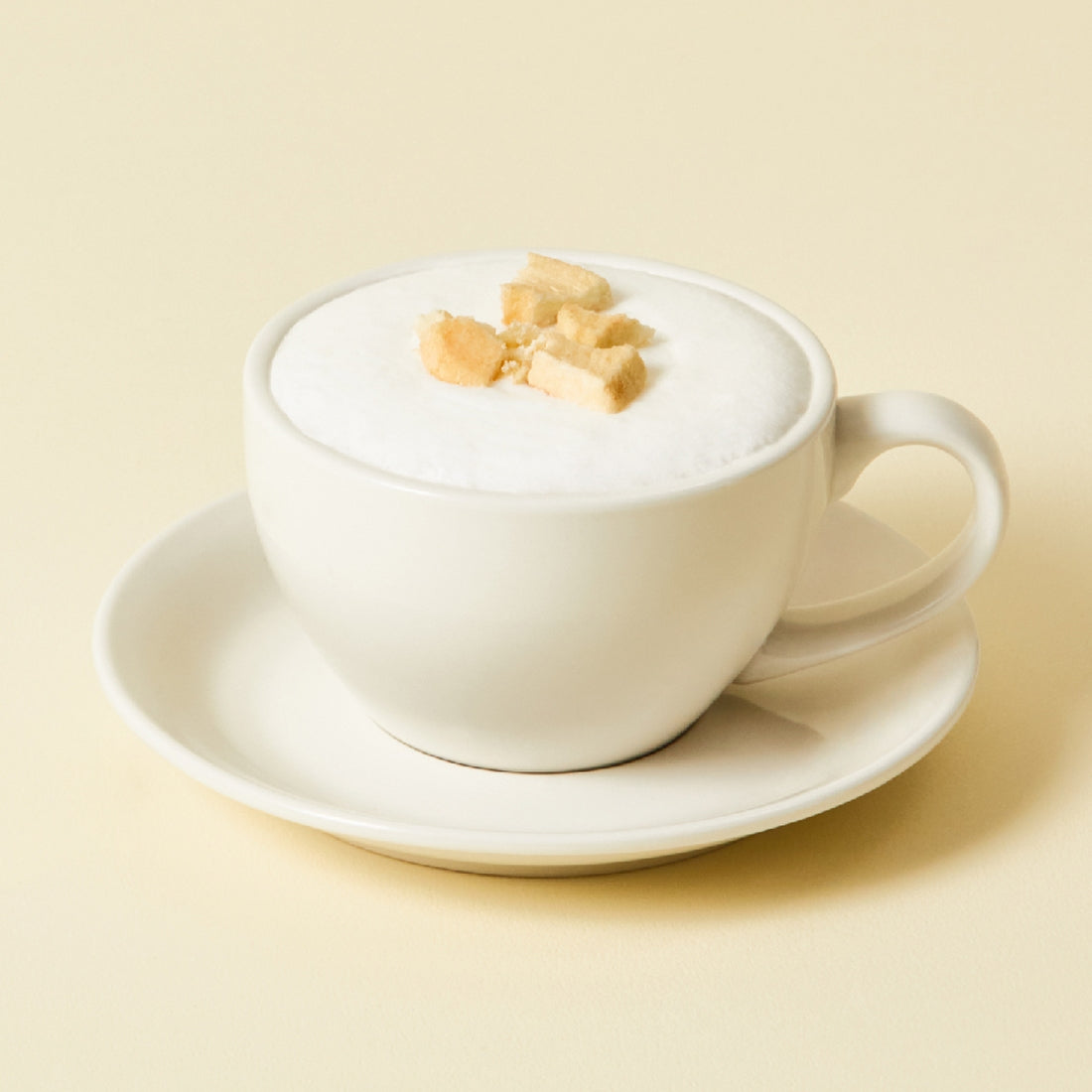OSULLOC Chamomile Blend 10 p : tasse crème avec fleurs de camomille, marque OSULLOC, fond beige, ambiance zen.