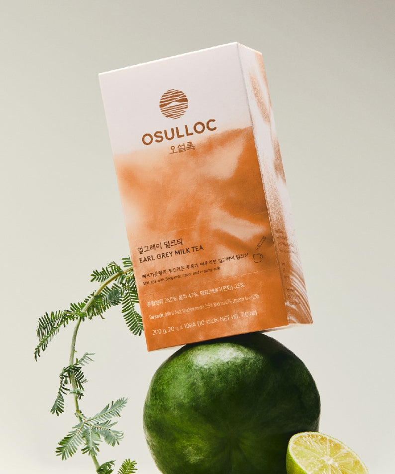 OSULLOC Earl Grey Milk Tea 10 p : sachet emballé sur fond clair, agrumes et melon, style visuel produit.