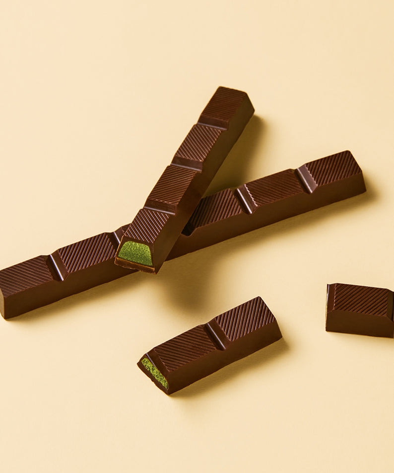 OSULLOC Jeju Island Green Tea Chocolate Bar 120g : barres de chocolat au thé vert, marque OSULLOC sur fond clair, contexte visuel.