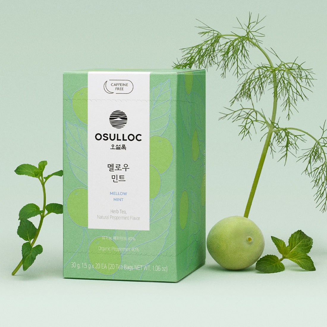 OSULLOC [Organic, Caffeine-Free] Mellow Mint, boîte et infusion aux herbes menthe sur fond clair, marque OSULLOC