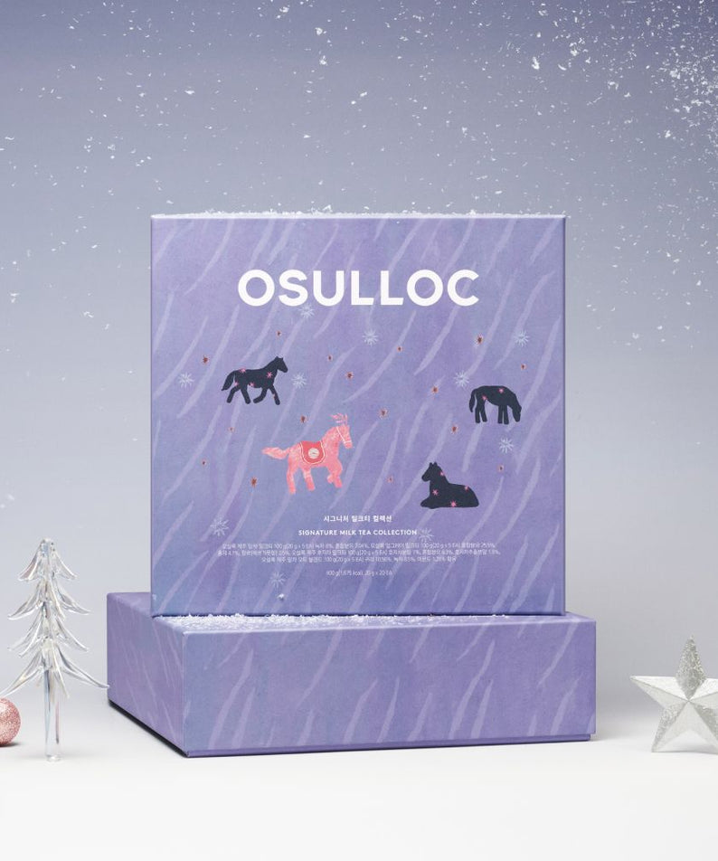 OSULLOC Signature Milk Tea Collection : coffret de thé au lait au design hivernal, décor blanc avec étoiles et sapin.