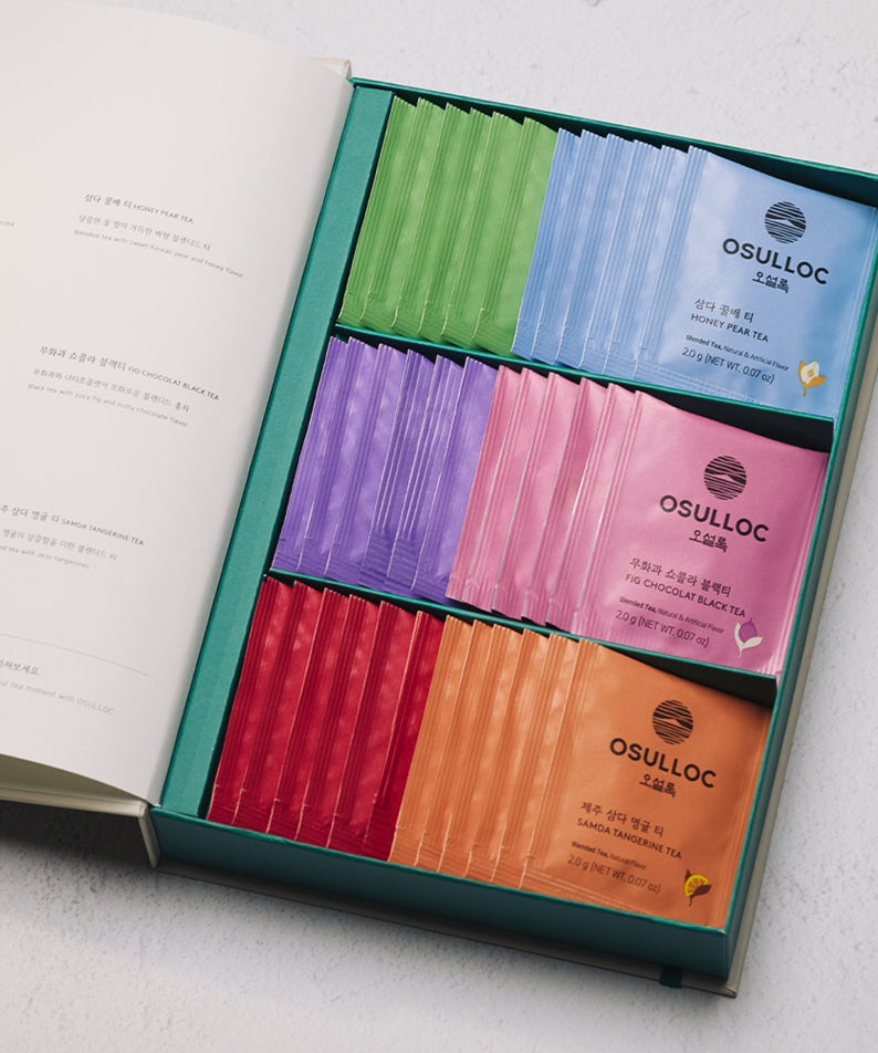 OSULLOC Tea Variation O 6 types : boîte assortie sur table, rubans de thés colorés, marque OSULLOC, ouvert.