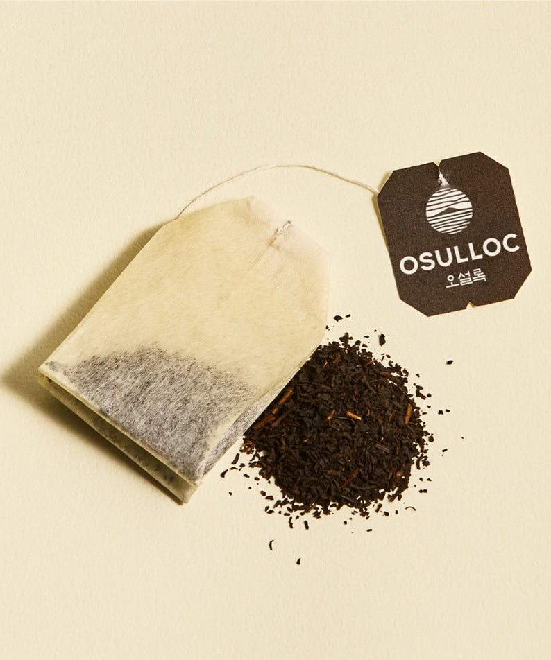 OSULLOC Yuja Earl Grey 20 p, sachet en filtre et feuilles de thé sur fond clair, marque OSULLOC