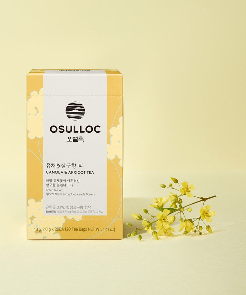 Boîte de thé OSULLOC Canola & Apricot Tea 20 P, thé aux fleurs de canola et abricot sur fond jaune avec des fleurs jaunes.