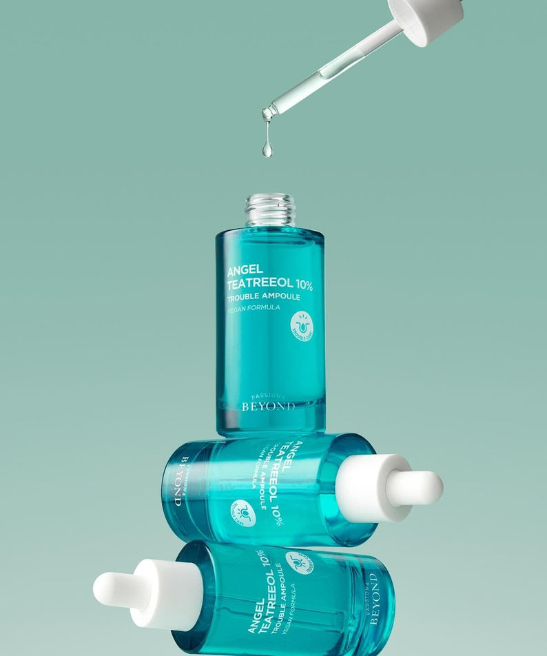 Flacon de PASSION&BEYOND Angel Tea Tree 10% Trouble Ampoule 50ml avec pipette, soin visage concentré en huile essentielle de tea tree.