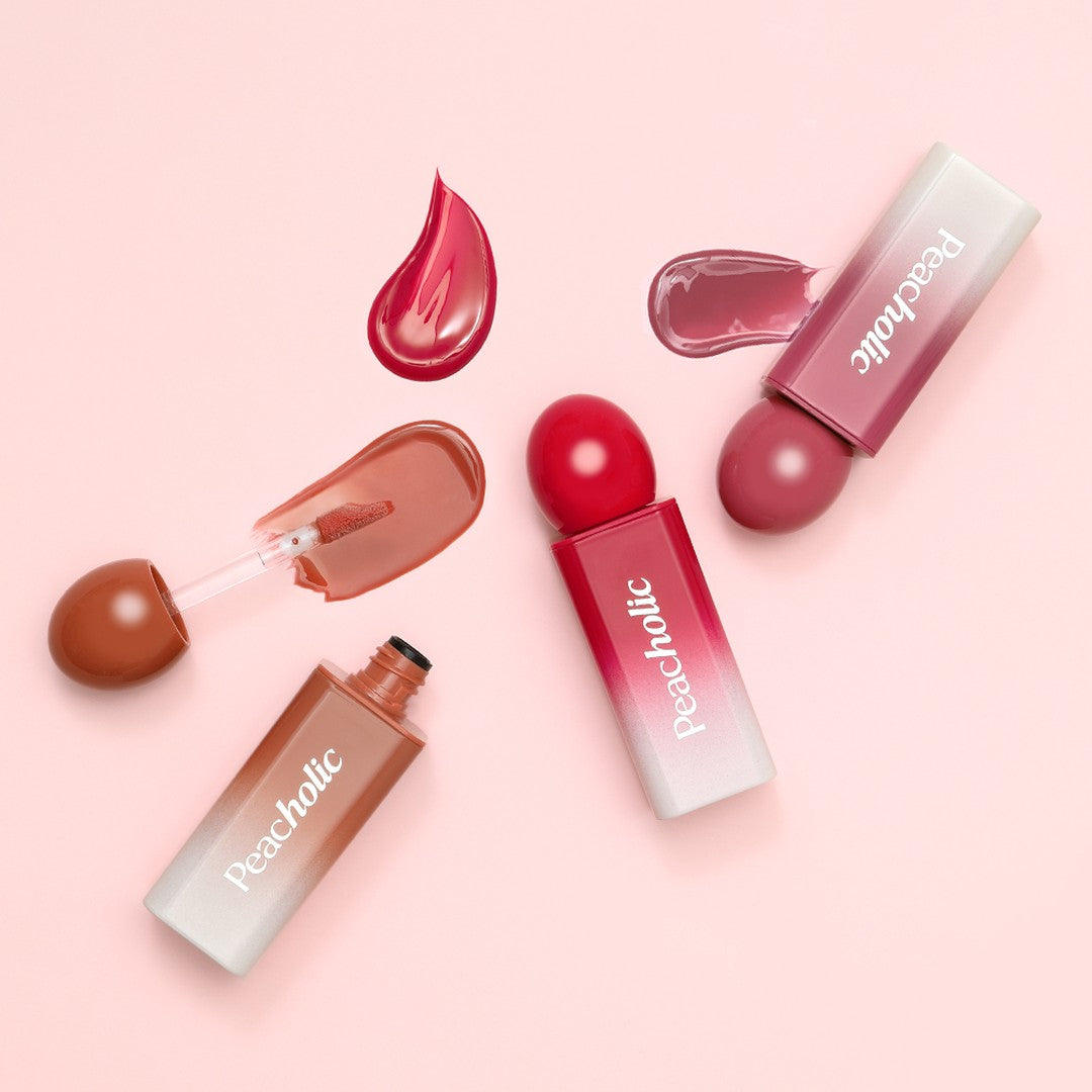 PEACHOLIC Water Glow Lip Tint de la marque PEACHOLIC sur fond rose, présentation cosmétique avec teintes brillantes