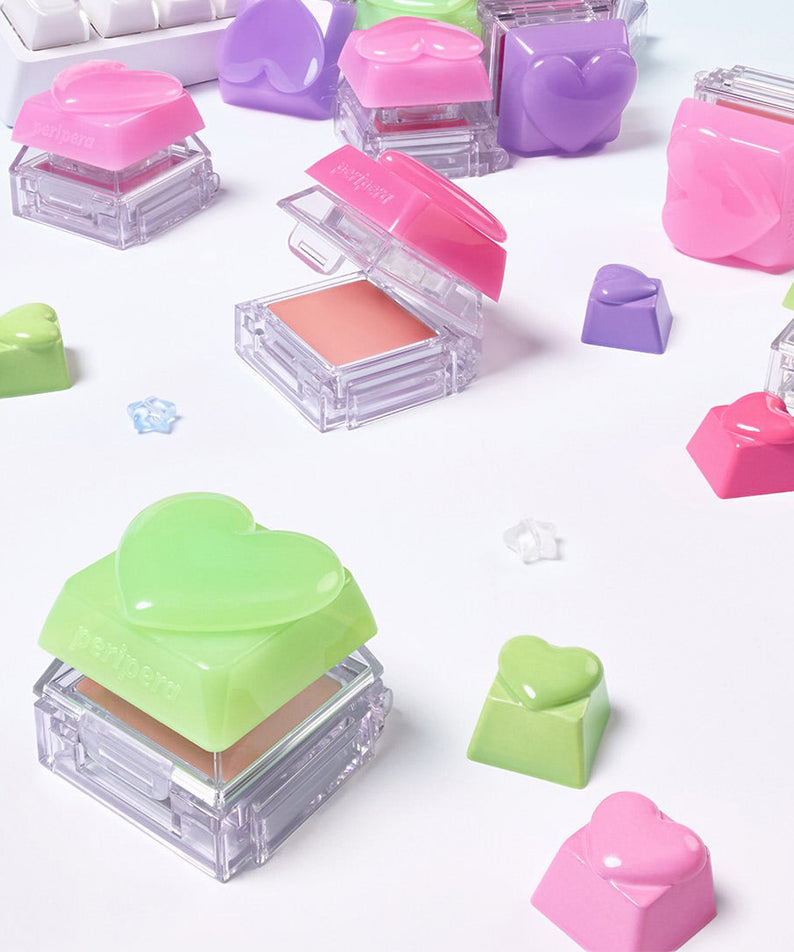PERIPERA Talk Blush Keycap, la marque PERIPERA : keycaps roses et violets sur fond blanc, produits en contexte maquillage.