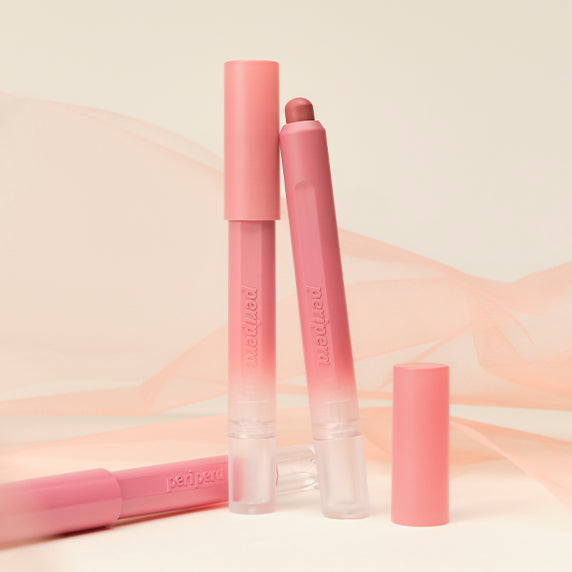 PERIPERA Slip On My Lip : gloss nude rosé en tubes, marque PERIPERA, décor minimal pastel rose.