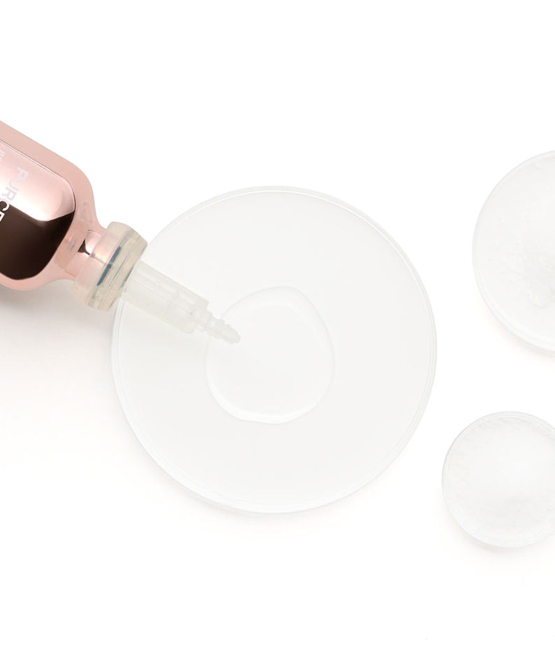 PURCELL 82% High Dose™ Peptide Formula 30mL de Purcell, flacon rose et ampoules, contexte visuel blanc.