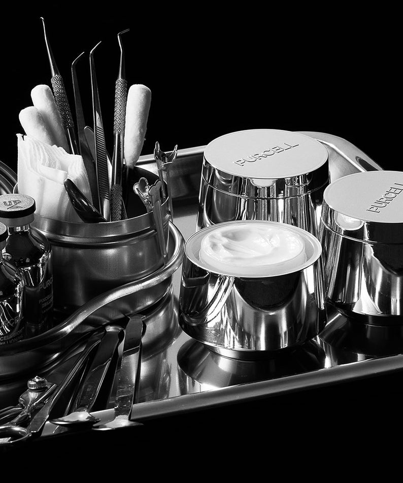 PURCELL PixelBiome™ After-Laser Rebooting Cream 50mL de la marque PURCELL, pot sur décor après-laser en contexte beauté.