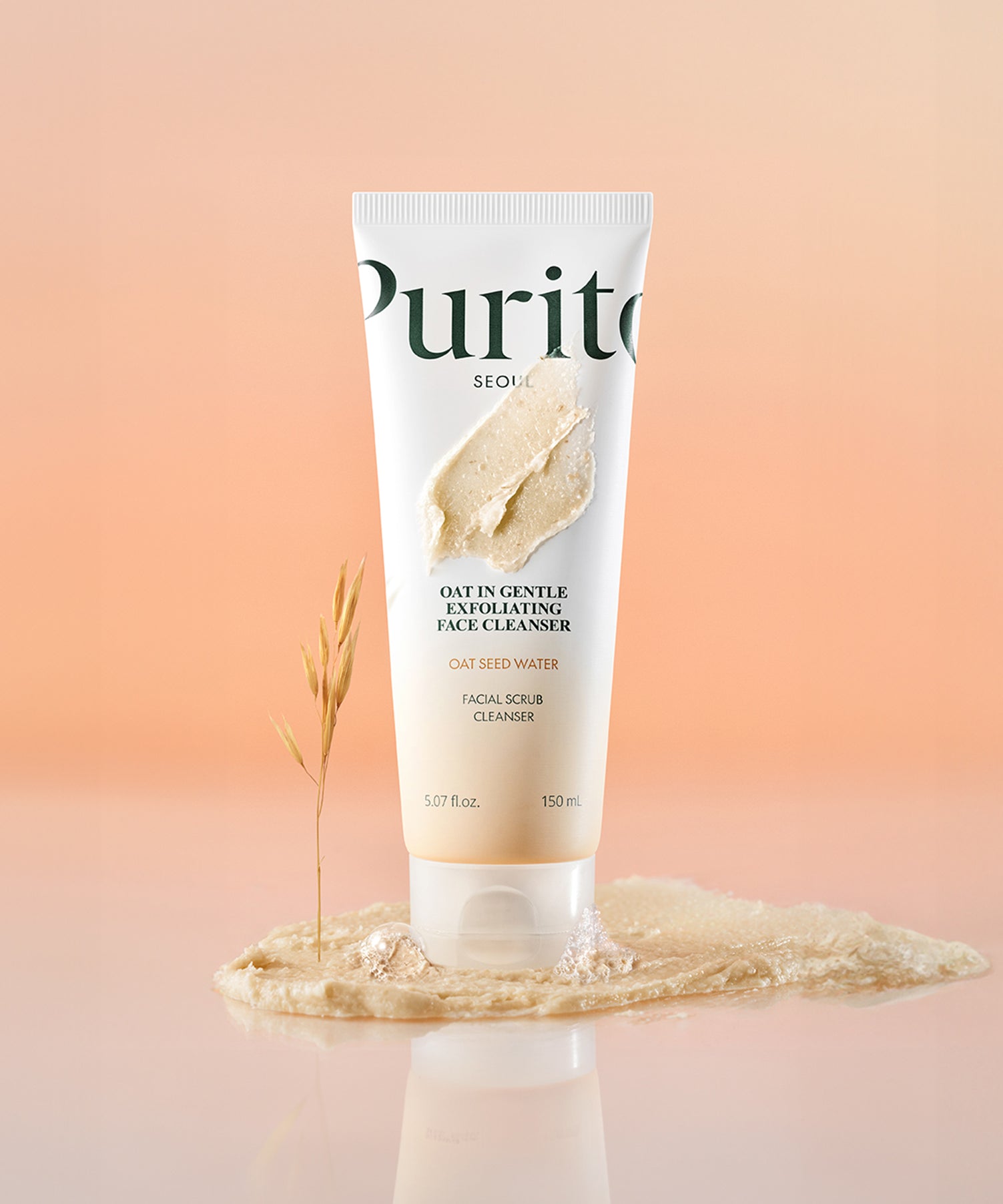 Décris l'image en français en mentionnant PURITO Oat in Gentle Exfoliating Face Cleanser, la marque Purito, tube sur fond beige.