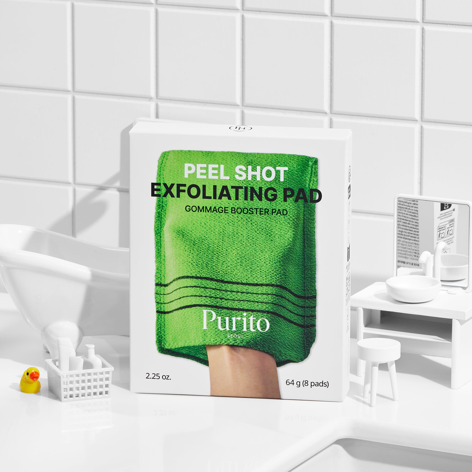 PURITO Peel Shot Exfoliting Pad 64g 8 Pads de Purito, boîte verte sur fond blanc carrelé, salle de bain.