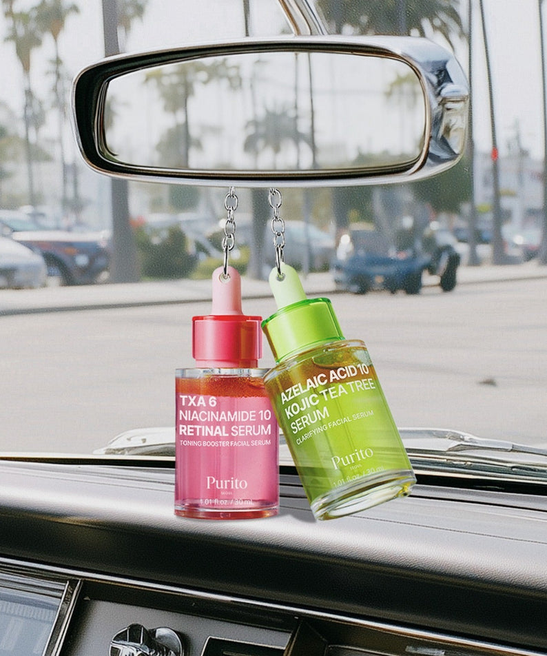 PURITO Tranexamic Acid 6 Niacinamide 10 Retinal Serum 30ml suspendu dans une voiture, parfait pour les soins de la peau.