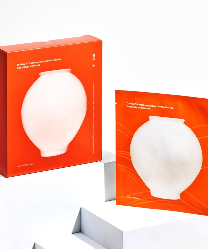 PYUNKANG YUL Brightening Porcelain Skin Mask Pack 10 pieces en boîte et sachet sur fond blanc