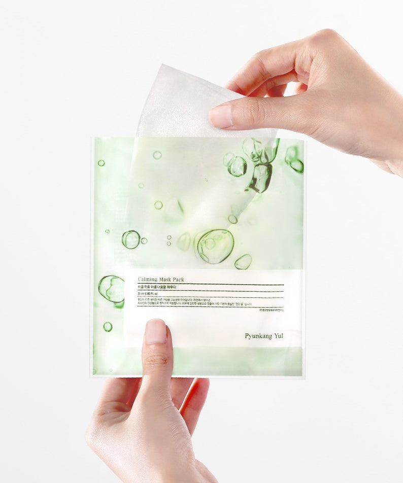 Emballage de la PYUNKANG YUL Calming Mask Pack 10 Pieces, montrant la texture apaisante et hydratante pour les soins de la peau en français.