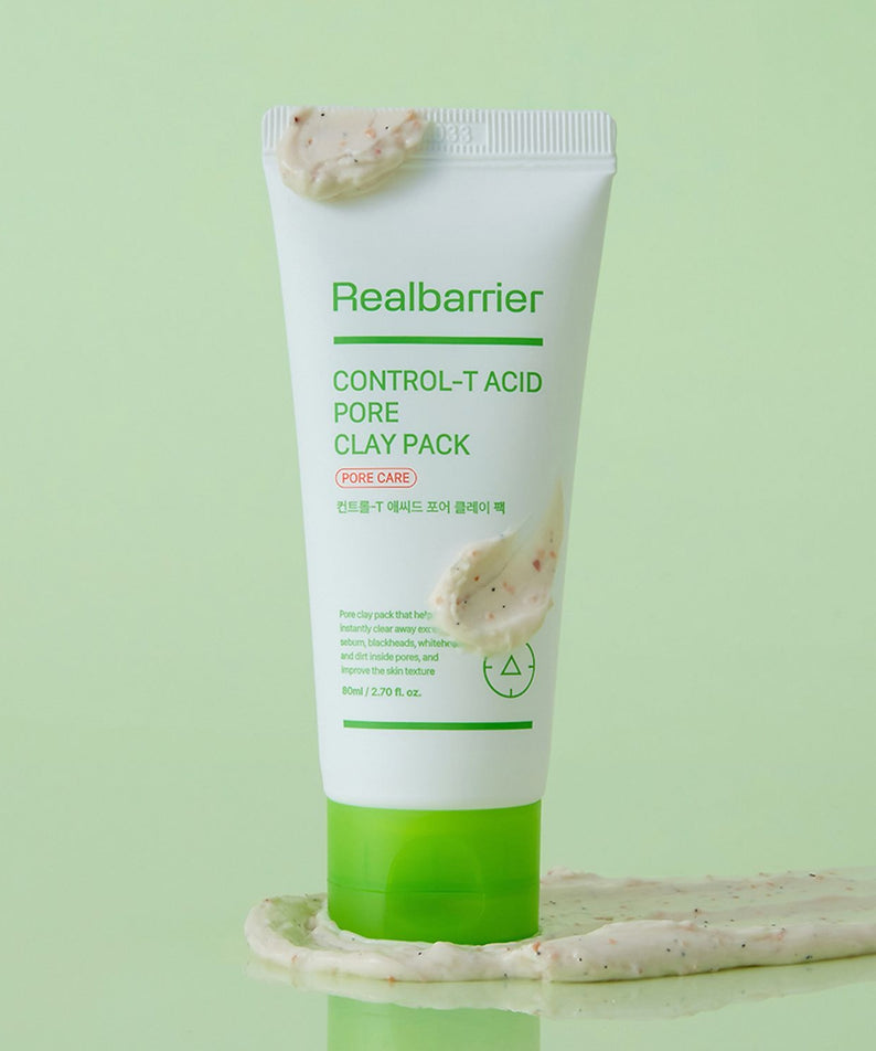REAL BARRIER Control-T Acid Pore Clay Pack 80ml de Realbarrier, tube sur fond vert pastel, appliqué avec argile.