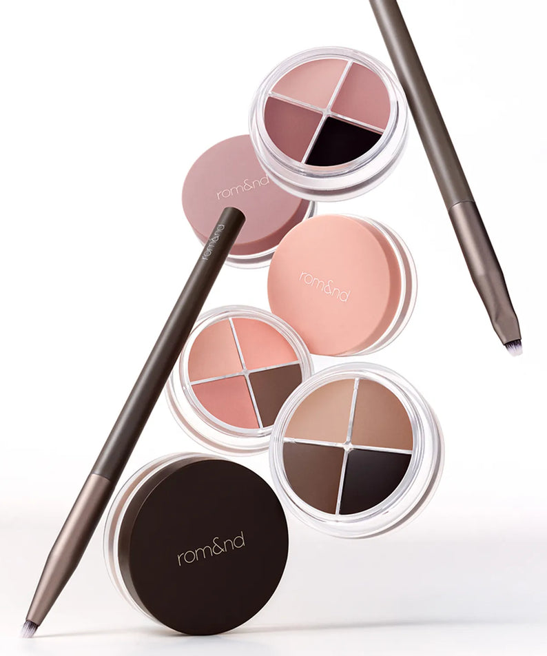 ROMAND  Hanol iPod Liner, vue sur liners maquillage dans boîtiers compartimentés, marque ROMAND, fond clair.