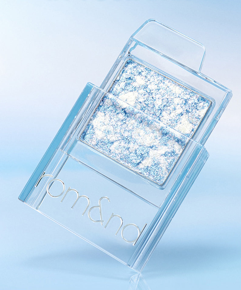 Palette de maquillage bleu glacé ROMAND SLIDE IN SINGLE #GURUMB, produit cosmétique innovant.