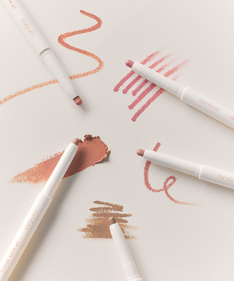 ROMAND lip mate pencil #beovershade avec des échantillons de couleurs de lèvres sur fond blanc.