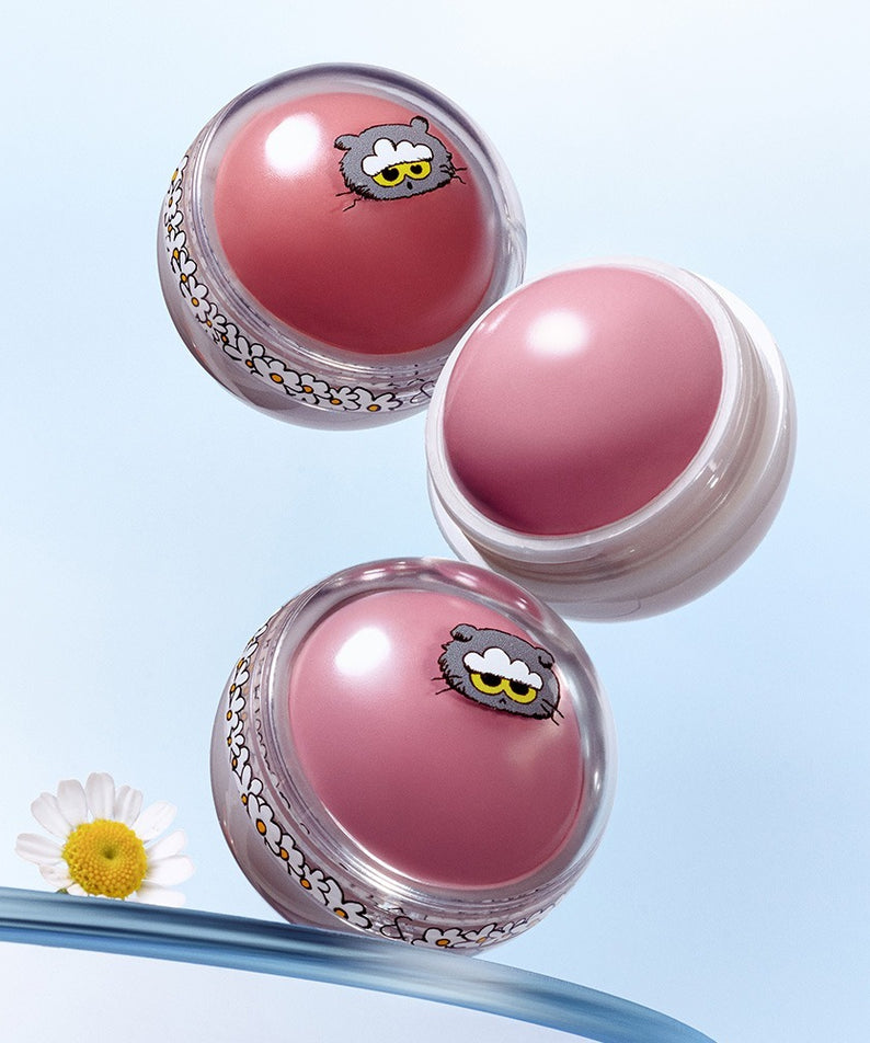 Décris l'image en français : ROMAND x Joanne Friends Juicy R Cheek (Special Set) avec packaging rose, sur fond bleu clair.