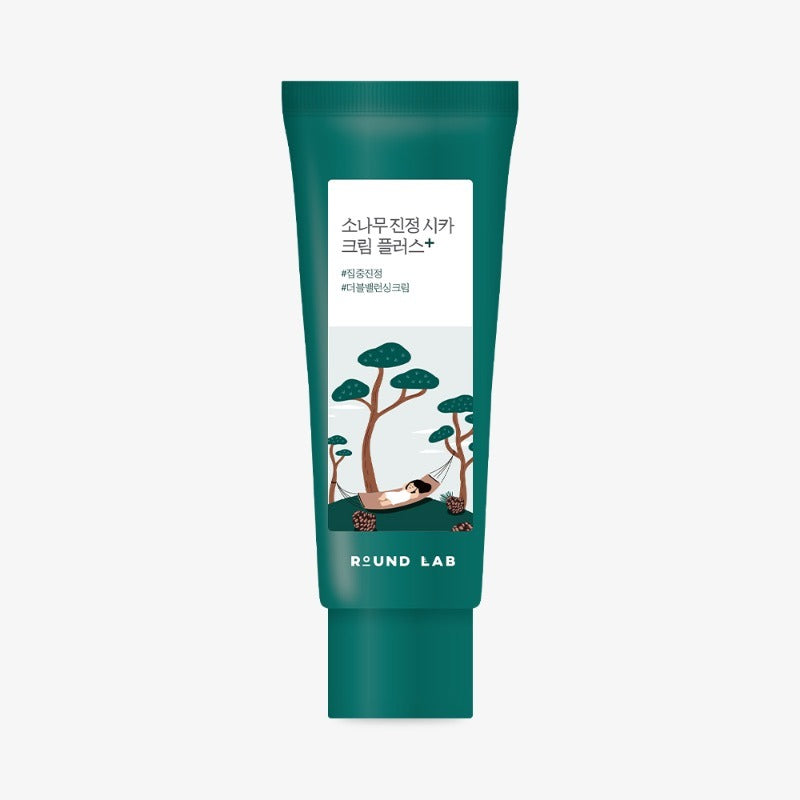 Décris l’image : ROUND LAB  Pine Calming Cica Cream Plus 60ml, tube vert sur fond clair, marque apaisante à la cica.