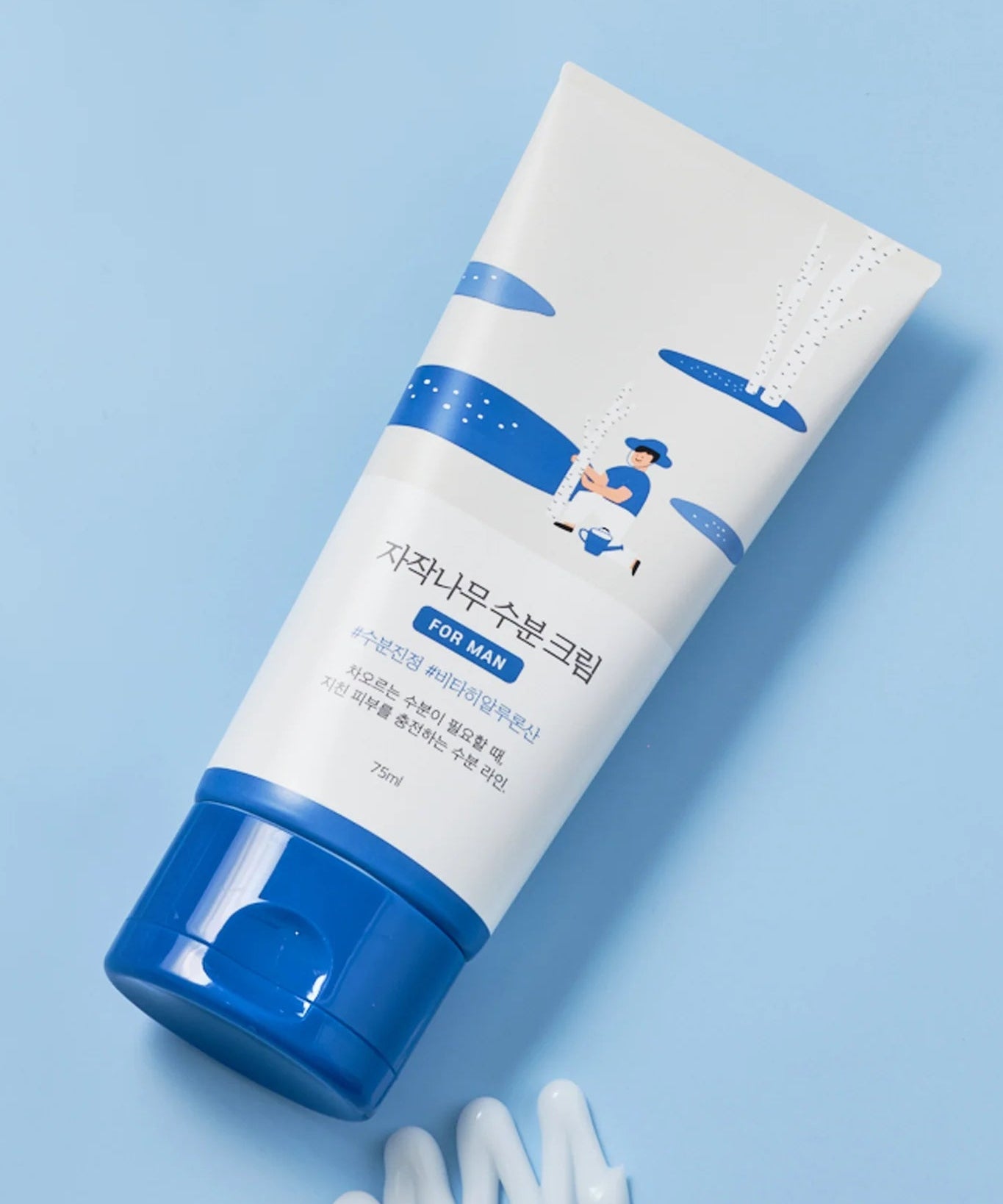 Crème hydratante ROUND LAB For Men Birch Moisture Cream 75ml sur fond bleu, hydratation pour peau masculine.