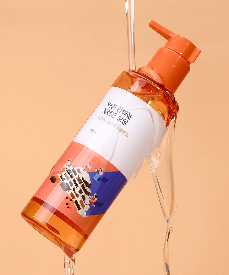 Huile nettoyante ROUND LAB Yakkong Panthenol Cleansing oil 200ml avec texture fluide, idéale pour démaquillage efficace.